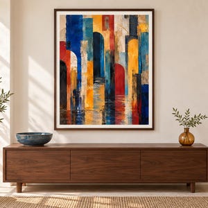 May include: A rectangular wall art piece featuring an abstract composition of vertical architectural arches in vibrant shades of deep blue, bright yellow, and bold red, with textured brushstrokes creating a layered effect on a light background.