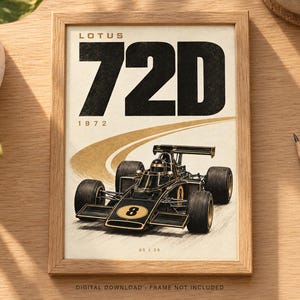 May include: A framed poster featuring a black and gold Lotus 72D Formula One race car with the number 8 on the nose. The text reads LOTUS 72D 1972 at the top and 05 / 20 at the bottom. The car is depicted on a stylized track against a cream background.
