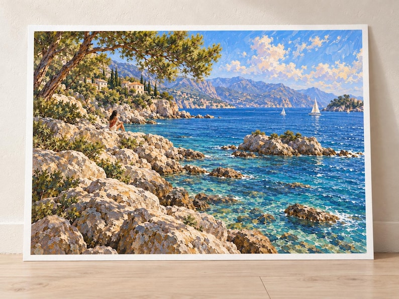 May include: A rectangular landscape painting featuring a rocky Mediterranean coastline with a person sitting on the shore, pine trees, distant villas, and sailboats on a bright blue sea under a sky filled with white clouds and warm sunlight.