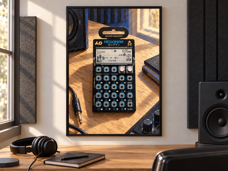 May include: A black Teenage Engineering PO-128 Mega Man pocket operator synthesizer in its original packaging. The device features a monochrome LCD screen, multiple circular buttons with blue accents, two silver knobs, and printed text including MEGAMAN.