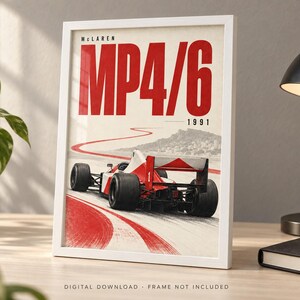 May include: A framed poster featuring a red and white McLaren MP4/6 Formula 1 race car from 1991 on a track. The text reads McLaren MP4/6 1991. The bottom of the print includes the text DIGITAL DOWNLOAD FRAME NOT INCLUDED in small capital letters.