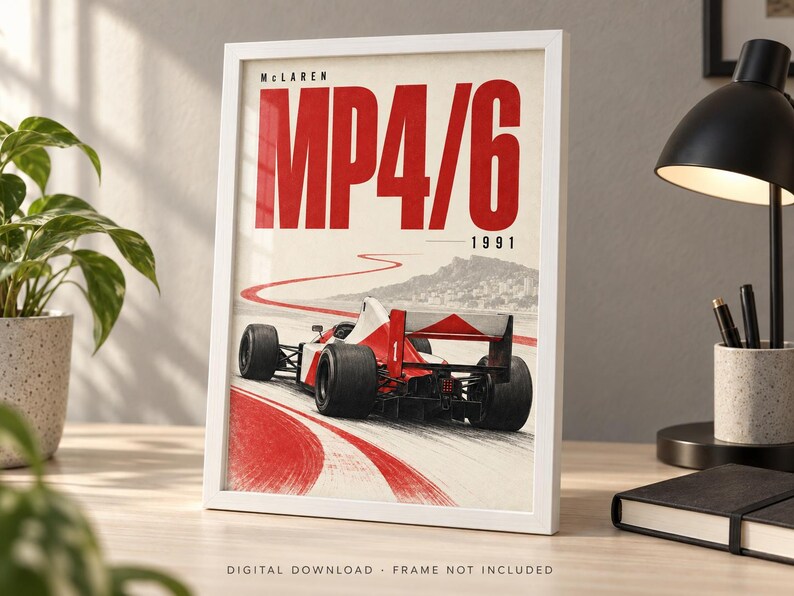 May include: A framed poster featuring a red and white McLaren MP4/6 Formula 1 race car from 1991 on a track. The text reads McLaren MP4/6 1991. The bottom of the print includes the text DIGITAL DOWNLOAD FRAME NOT INCLUDED in small capital letters.