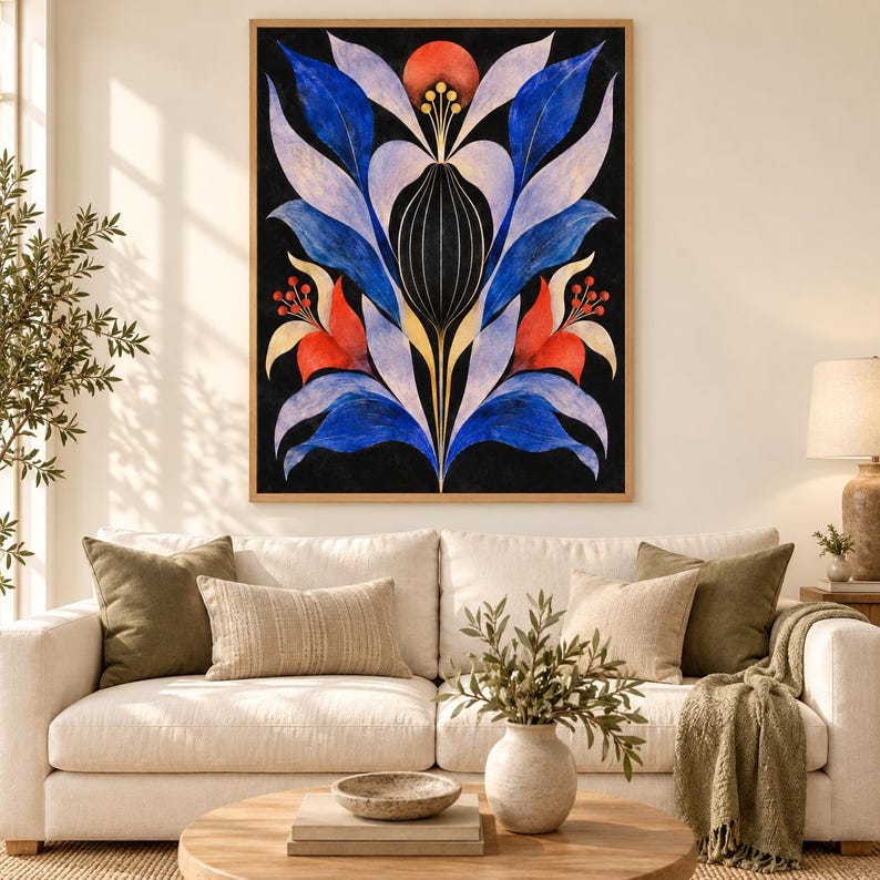 May include: A rectangular wall art print featuring a symmetrical botanical illustration on a black background. The design displays stylised blue, light purple, and orange leaves and petals arranged in a vertical, centred floral pattern.