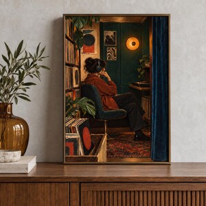 May include: A framed wall art print depicting a person wearing headphones, seated in a dark green room with a tall bookshelf filled with vinyl records, a round wall lamp, and a patterned rug, all framed in a thin metallic gold border.