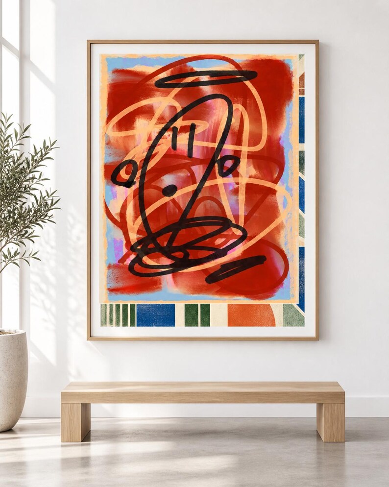K&ouml;nnte beinhalten: Ein gerahmtes, rechteckiges Wandbild mit einer zentralen Komposition aus kr&auml;ftigen schwarzen Kritzeleien, die &uuml;ber abstrakten roten, orangefarbenen und hellblauen Formen liegen. Der untere Rand zeigt ein Muster aus vertikalen gr&uuml;nen, blauen und orangefarbenen Streifen.
