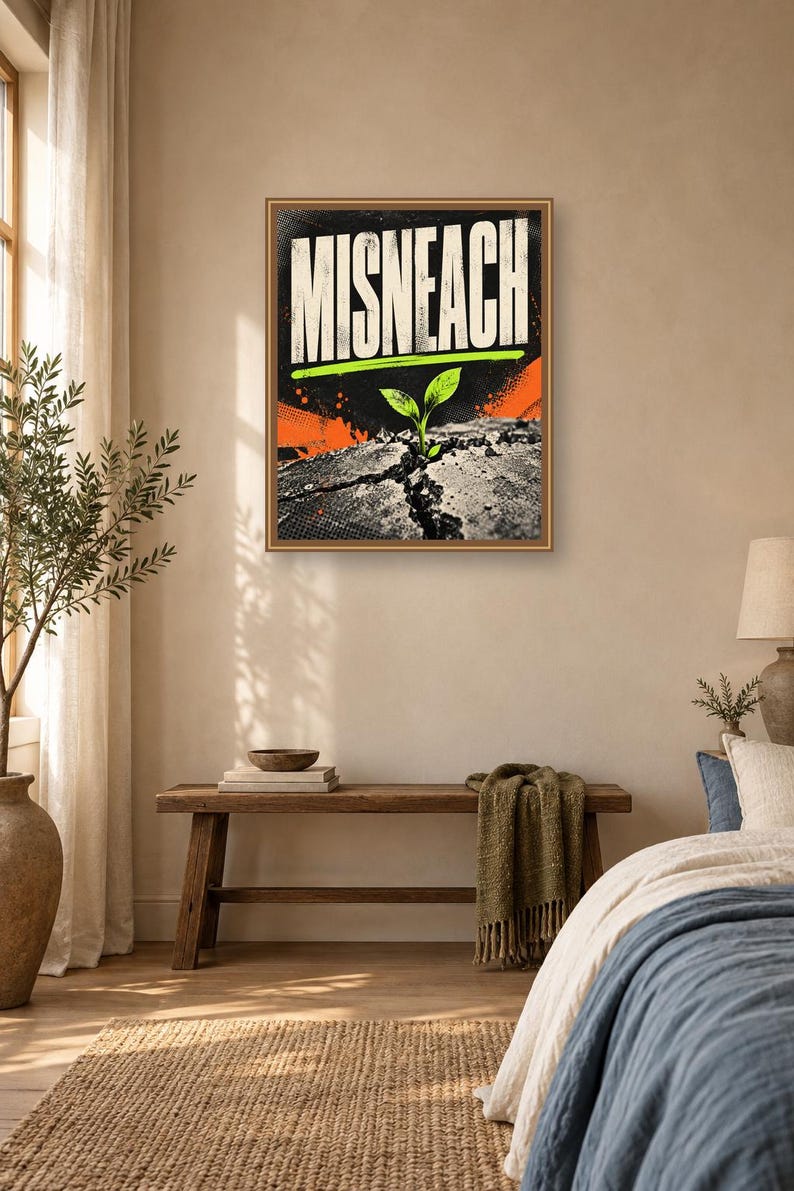 May include: A rectangular wall art print featuring the word MISNEACH in bold white capital letters. Below the text, a small green sprout emerges from a cracked gray surface. The background includes black textured patterns and bright orange accents.