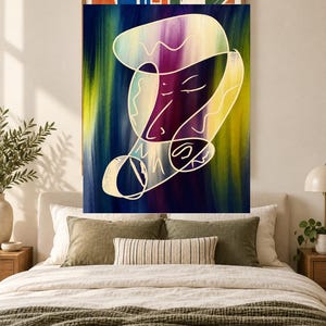 May include: A rectangular wall art piece featuring a central abstract face outlined in white lines against a vertical gradient background of deep blue, purple, and bright yellow. The composition includes stylized facial features and geometric shapes.