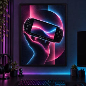 May include: A framed wall art print featuring a black handheld gaming console with a screen, buttons, and the text PSP. The console is illuminated by vibrant neon pink and blue light effects against a dark background, creating a glowing aesthetic.