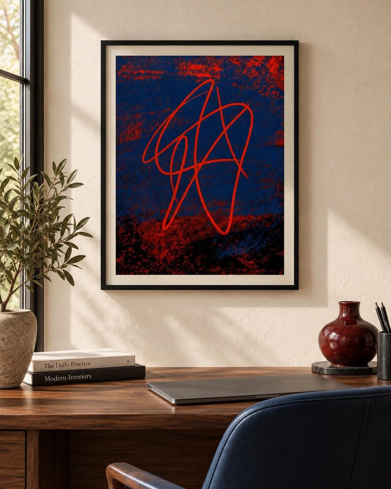 May include: A framed wall art print featuring a dark blue and black textured background with a prominent, bright red continuous line drawing that forms an abstract, tangled shape centered within the composition, enclosed in a thin black frame.