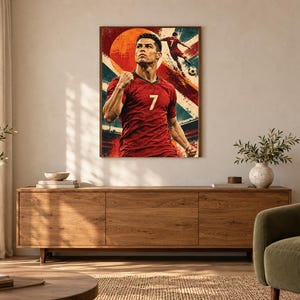 May include: A rectangular wall art print featuring a portrait of a soccer player in a red jersey with the number 7, set against a stylized background with a large orange circle, blue geometric shapes, and a smaller figure kicking a soccer ball.
