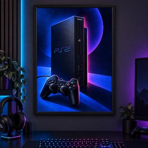 May include: A framed wall art print featuring a black Sony PlayStation 2 console and a matching black controller. The console displays the PS2 logo in blue text, while the background is illuminated with vibrant blue and purple neon circular lighting.