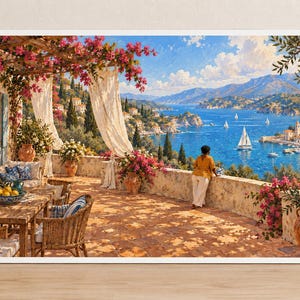 May include: A framed wall art print depicting a sunlit Mediterranean terrace with a stone wall, wicker furniture, and a bowl of lemons. A person in a yellow shirt stands by the wall overlooking a blue bay with sailboats, mountains, and pink flowers.