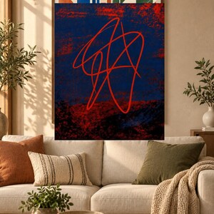 May include: A rectangular wall art piece featuring a dark blue background with textured red and black areas. A prominent, continuous red line forms an abstract, tangled scribble pattern across the center of the composition, creating a bold contrast.