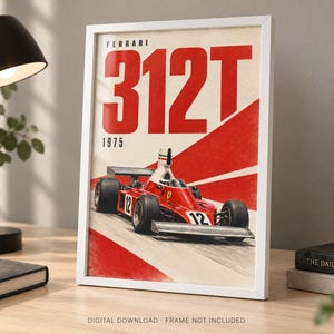 May include: A framed poster featuring a red Ferrari 312T Formula 1 race car with the number 12. The text reads FERRARI 312T and 1975 in bold red and black lettering. The design includes a red diagonal graphic element on a white background.