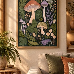 May include: A framed wall art print featuring a dark green background with various botanical illustrations including several mushrooms in shades of orange, purple, and green, alongside assorted leaves, ferns, and small round seed pods.