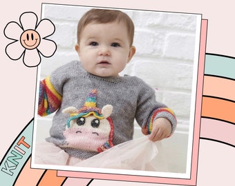 May include: A gray knitted sweater with rainbow stripes on the sleeves and a pink unicorn applique on the front. The unicorn has a rainbow mane and horn. The sweater is being worn by a baby.