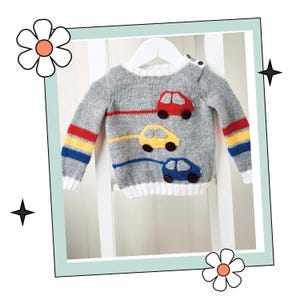 May include: A grey knitted sweater with colourful stripes on the sleeves and three appliqué cars on the front. The cars are red, yellow and blue.