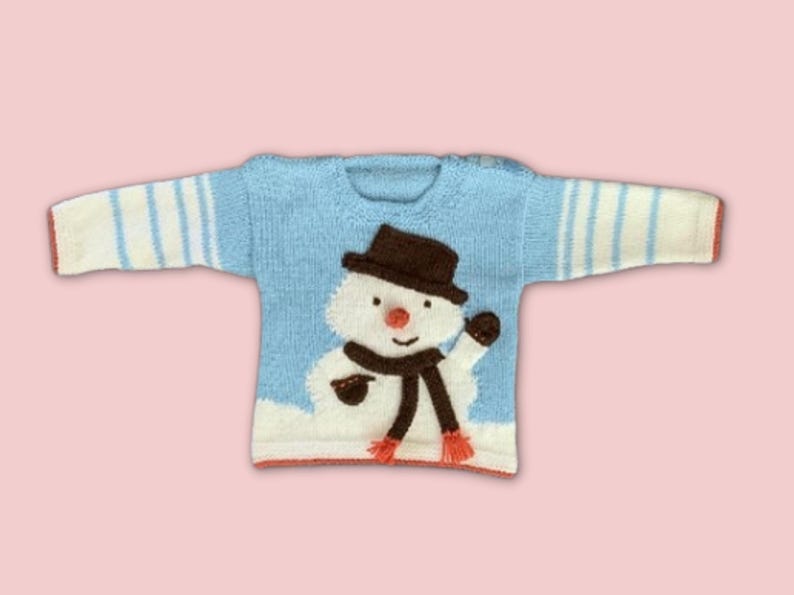 my first christmas jumper, baby christmas jumper with snowman intarsia motif wearing a top hat and scarf, christmas sweater for baby jane burns
