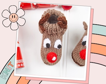 May include: Knitted reindeer boot covers with brown fur, a red nose, black eyes, and white accents. The boot covers are on a white surface.