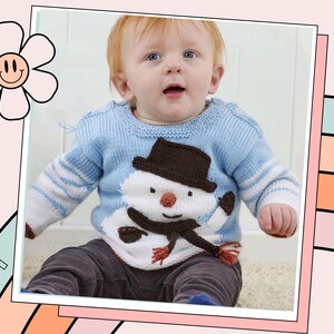 my first christmas jumper, baby christmas jumper with snowman intarsia motif wearing a top hat and scarf, christmas sweater for baby jane burns