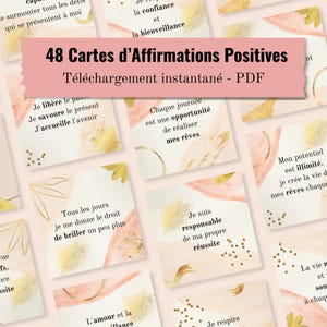 May include: A collection of square cards featuring positive affirmations in French, decorated with soft pink watercolour washes, gold foil-style brush strokes, and small star icons. A pink banner at the top displays the text 48 Cartes d'Affirmations Positives.