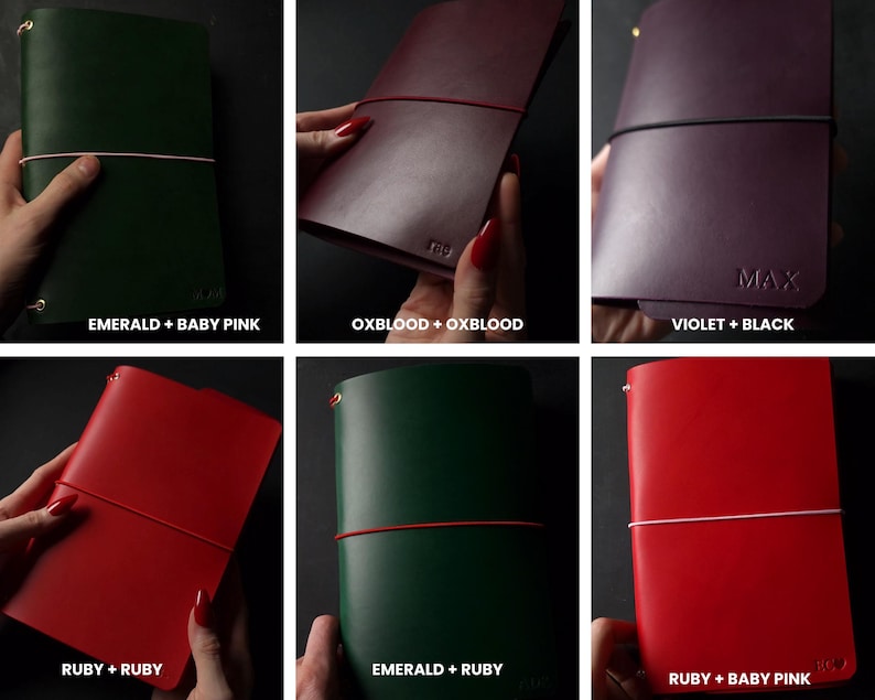 May include: A collection of leather journals in various colors, each secured with an elastic band. Colors include emerald with baby pink, oxblood, violet with black, ruby, and emerald with ruby. Some journals have text.