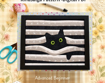 May include: A Kinusaiga pattern digital PDF titled Mischievous Kitty, Advanced Beginner, US Letter, 8x10 inches. The image features a black cat with bright green eyes peeking through horizontal black and beige fabric strips in a black frame.