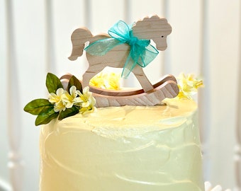 Gorgeous Rocking horse cake topper. Unique design to create a beautiful baby shower must have. Makes a newborn gift to add to nursery decor.