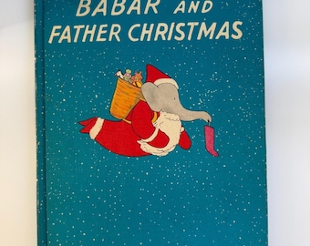 Książka w twardej oprawie „Stary Babara i Święty Mikołaj” – Jean de Brunhoff – Random House Book Club Edition – ilustrowana książka dla dzieci o tematyce bożonarodzeniowej