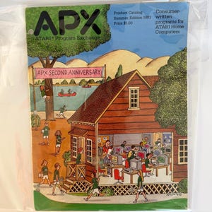 May include: A 1983 Atari Program Exchange product catalog featuring a colorful illustration of a house filled with people using computers. The cover text reads APX, Atari Program Exchange, Product Catalog, Summer Edition 1983, and APX Second Anniversary.