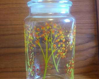 One Pyrex clear canister/glass jar with Orange, Yellow, Green Pyrex Daisey flower Tree design 1970's