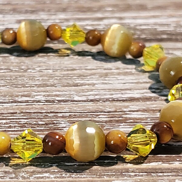 Olivine cats eye beads with tiger eyes and yellow swarovski crystal bracelet with magnetic clasp