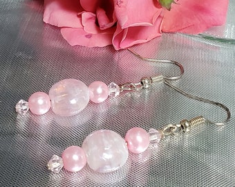 Delicate pink and white swirl lampworks earrings accented with pink pearls and pink swarovski crystals