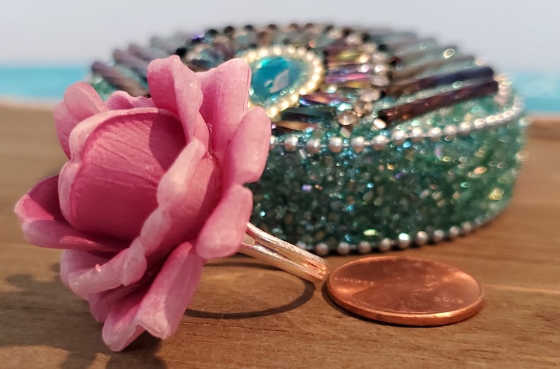 Elegant Pink Flower Set on a Silver Adjustable Ring