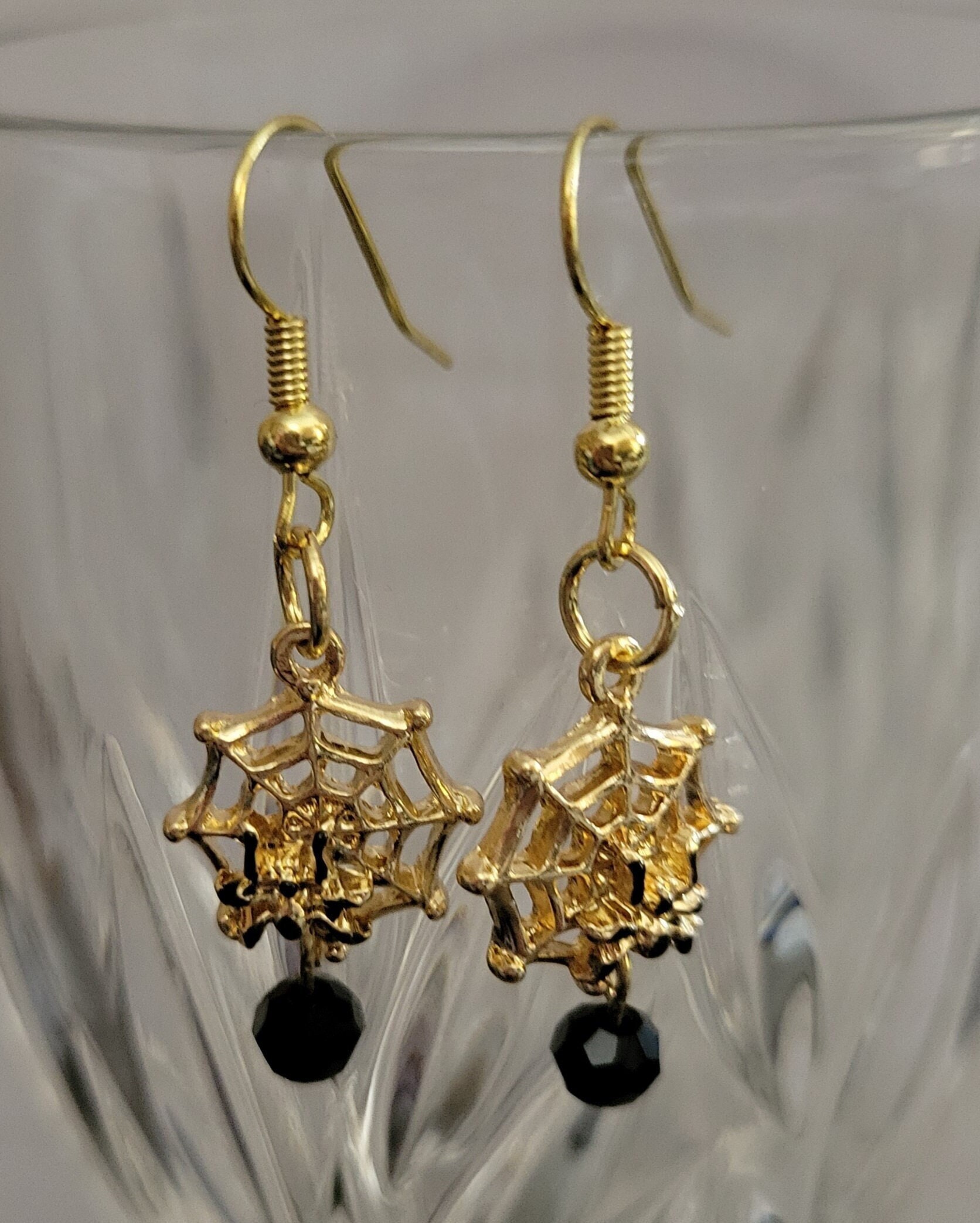 Swarovski spider web on sale earrings