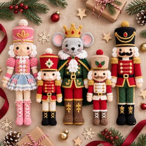 May include: Five crocheted dolls arranged in a row, including a pink nutcracker, a small red nutcracker, a central mouse king wearing a gold crown and green cape, a small tan nutcracker, and a tall red and green nutcracker with a black hat.