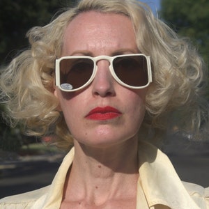 Deadstock 1930s white framed sunglasses and translucent brown wide temples, brown lens,  The Tremblers