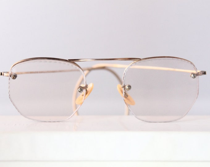 1930s rimless gold filled eyeglasses with Deco patterning by "W" or Wellington Optical, The Continental