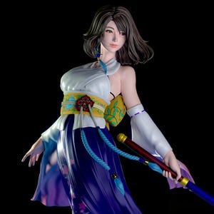 May include: A stylized figurine of a character with shoulder-length brown hair, wearing a white top and a long, flowing dark blue skirt with floral patterns. The figure features a yellow obi sash with a red floral emblem and holds a long staff.