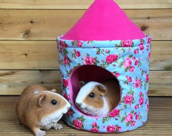 10” round house hidey with a pitched roof for a small pet. Option to add a flag. Range of patterns and colours available