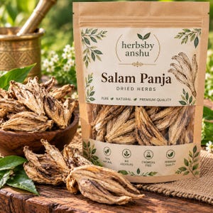 May include: A brown paper pouch labelled herbsby anshu Salam Panja dried herbs with a clear window showing dried roots. The packaging features green leaf illustrations and text including pure, natural, premium quality, no additives, and chemical free.