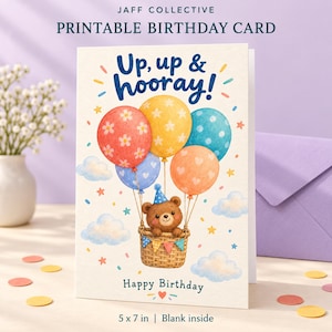 May include: A printable birthday card featuring a brown bear in a wicker basket attached to colorful balloons with the text Up, up & hooray! and Happy Birthday. The card is 5 x 7 inches and displays a whimsical illustration of balloons and clouds.