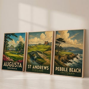 May include: Three rectangular wall art prints featuring vintage-style golf course illustrations. The left print shows Augusta, Georgia, the center print depicts St Andrews, Scotland, and the right print displays Pebble Beach, California.