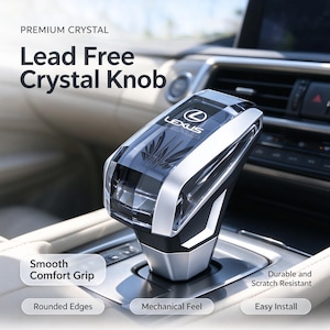 May include: A lead-free crystal gear shift knob for a Lexus vehicle, featuring a clear, faceted design with a black interior graphic, silver-toned accents, and the Lexus logo. Text on the image includes Premium Crystal, Lead Free Crystal Knob, Smooth Comfort Grip, Durable and Scratch Resistant, Rounded Edges, Mechanical Feel, and Easy Install.