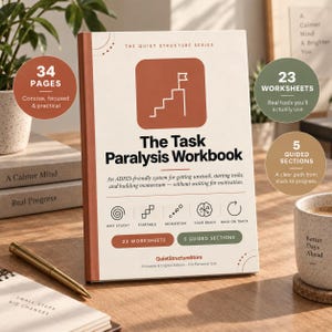 May include: A softcover workbook titled The Task Paralysis Workbook from The Quiet Structure Series. The cover is cream with a rust-colored square icon featuring a flag on stairs. It lists 34 pages, 23 worksheets, and 5 guided sections.