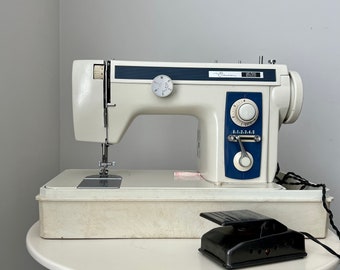 How do I clean and maintain the Singer Merrit Sewing Machine-VS