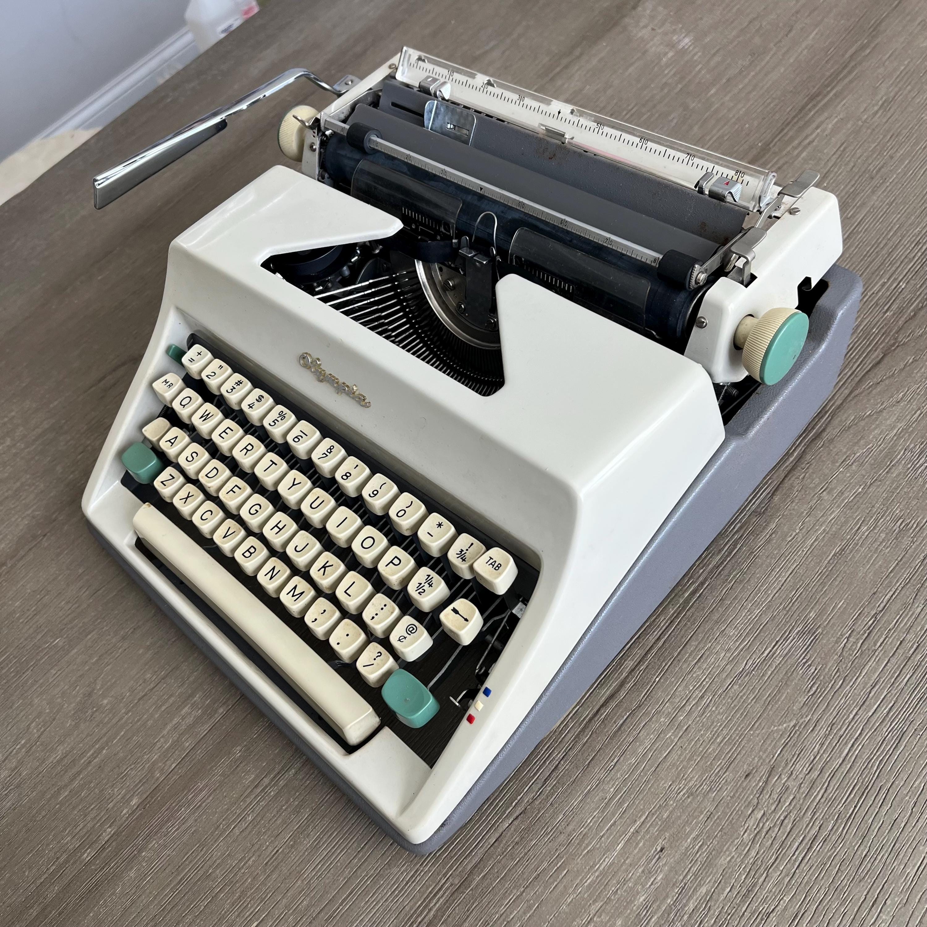 Vintage Olympia Portable Typewriter: West Germany, QWERTY, With