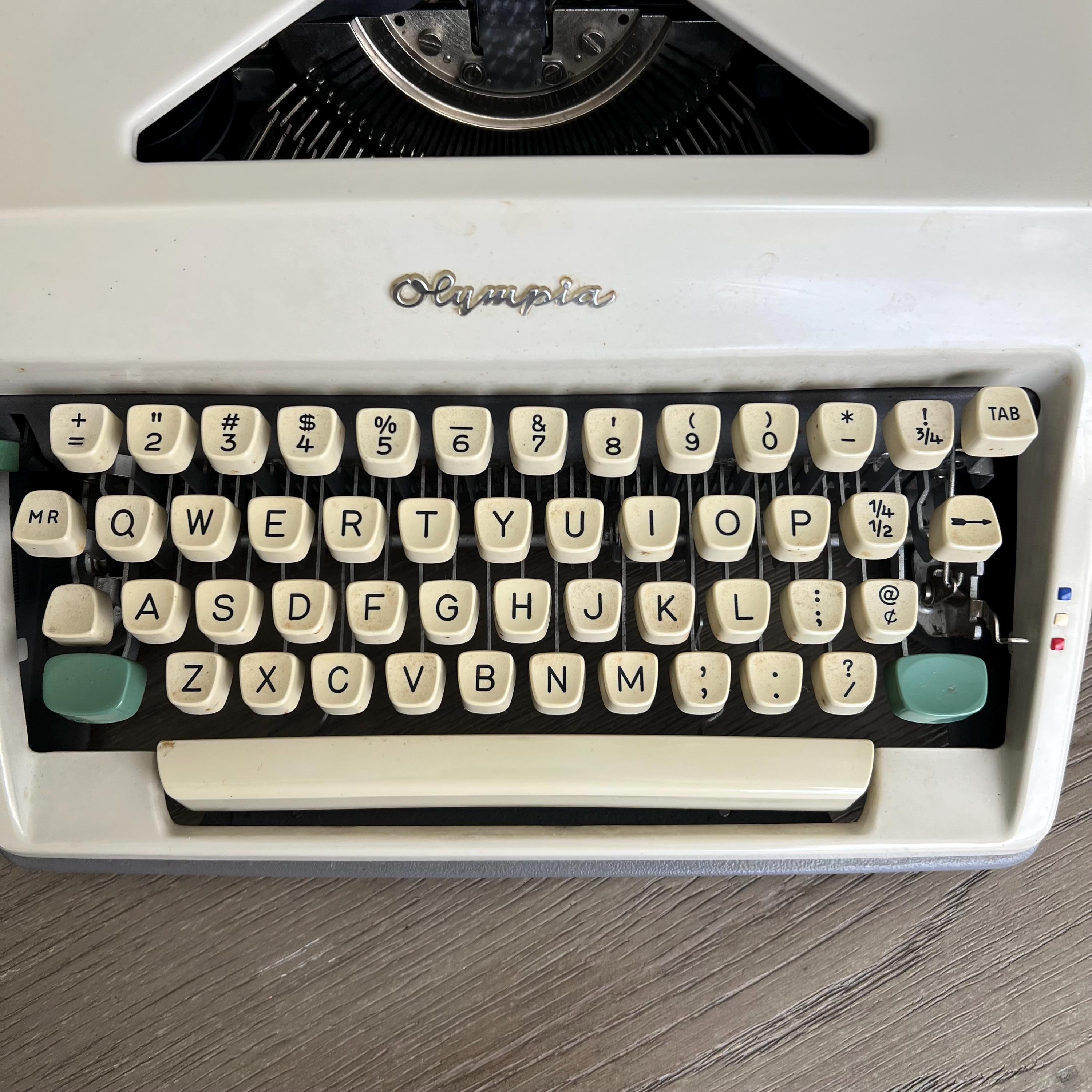 Vintage Olympia Portable Typewriter: West Germany, QWERTY, With
