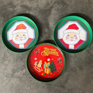 Vintage Christmas Tin Trays By Cheryl Johnson For Enesco Large Round Santa Christmas Plates Decorated Metal Ware Made in Hong Kong
