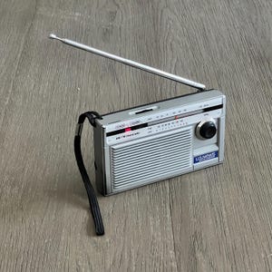 Vintage AM FM Handheld Portable Transistor Radio US News & World Report Radio Tested Working Condition Made in Hong Kong